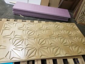 Star pattern architectual design patterns machined into a wood panel