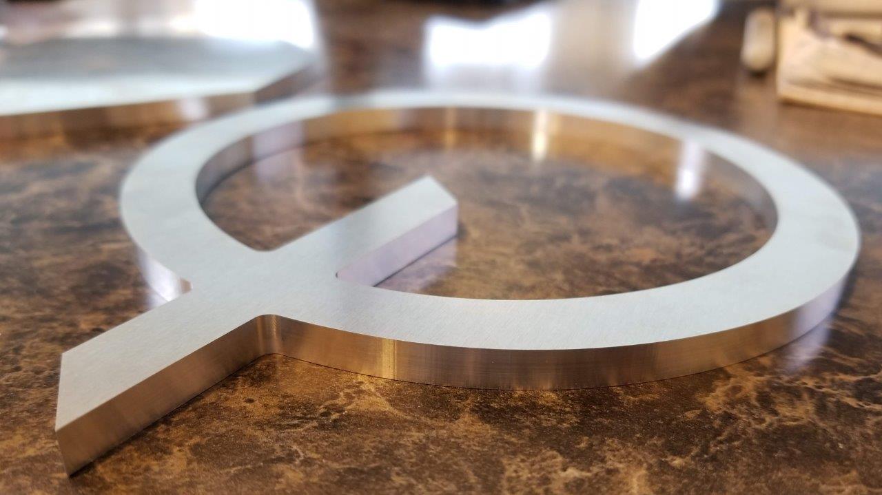 CNC machined aluminum letter