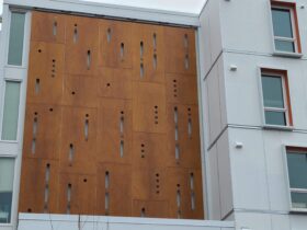 Wooden architectural panels mounted on a building.